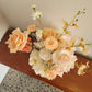 Bouquet of flowers on a wooden surface with a speckled countertop in the background