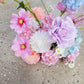 Colorful flower arrangement on a concrete surface