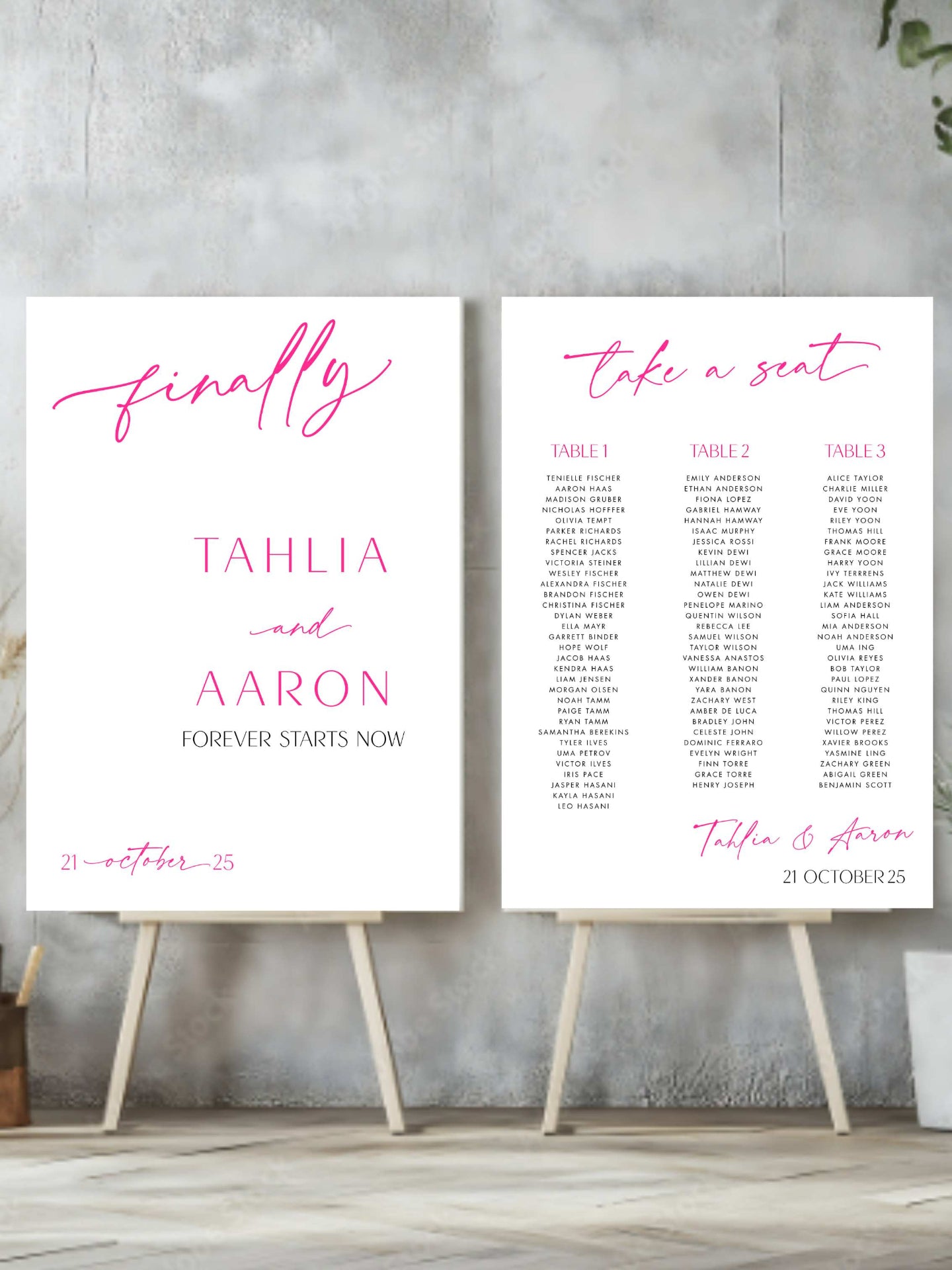 welcome sign and seating charts on easels with decorative text against a concrete wall.