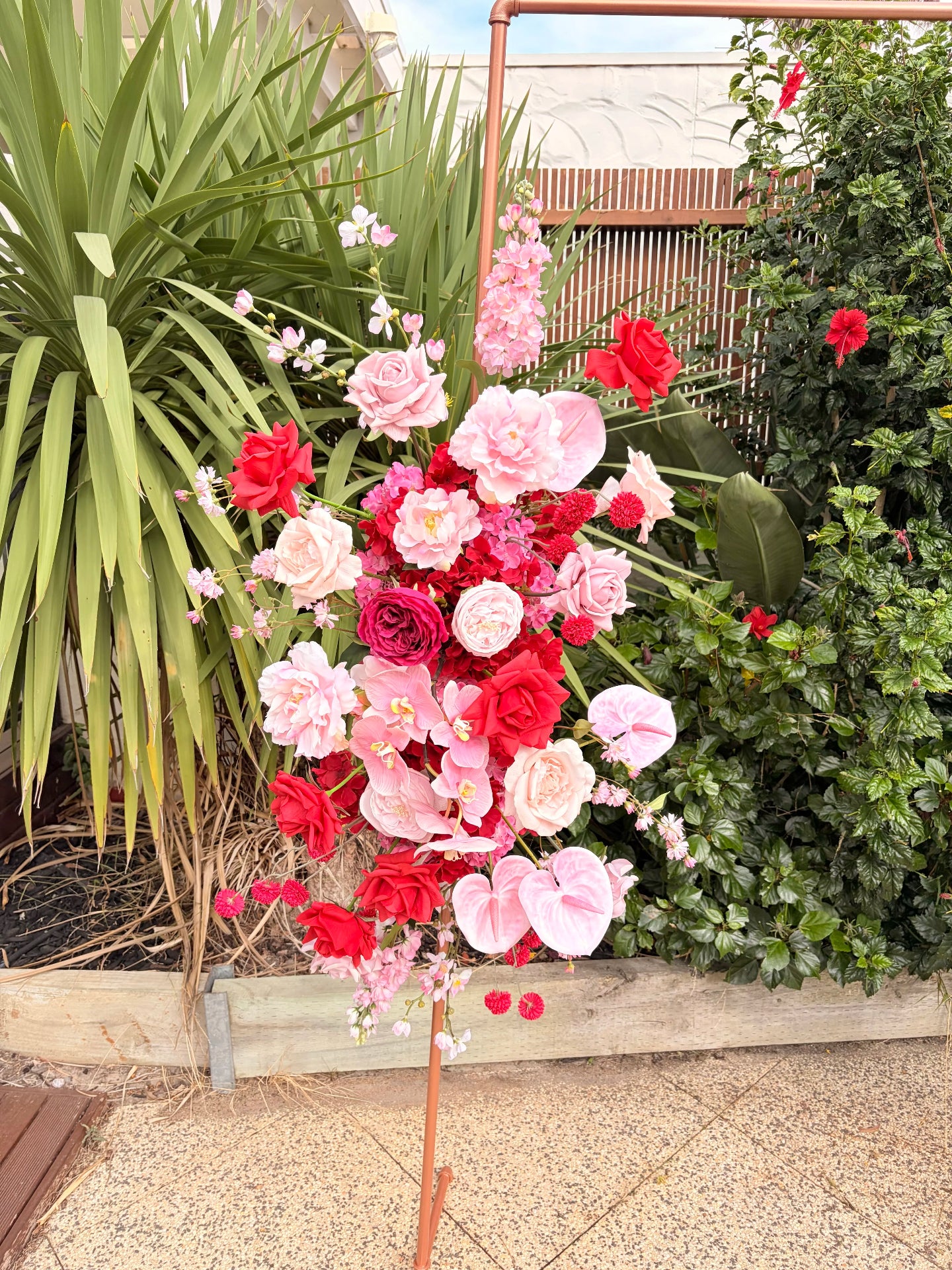 Pink and red arbour floral arrangement